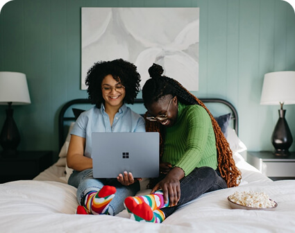 Team collaboration on laptop